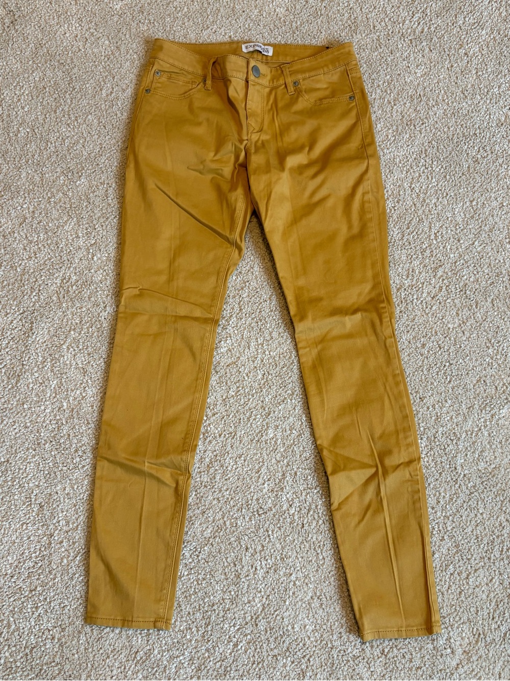 Express mustard yellow skinny jeans